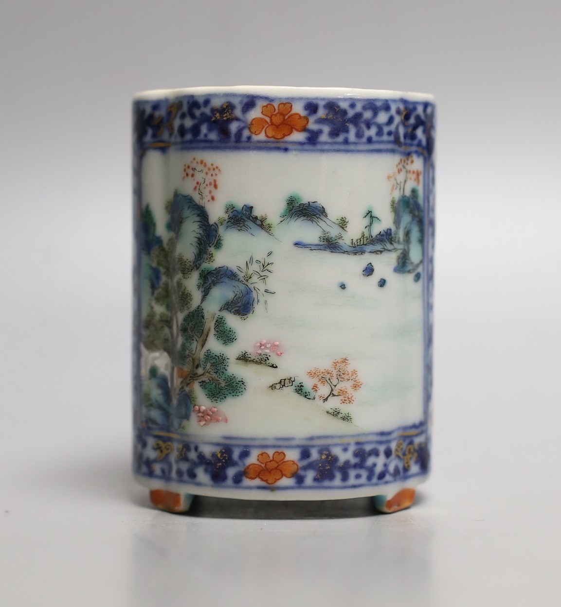 A Chinese famille rose fencai brush pot, Qianlong seal mark but 19th century, 8.1 cm high, wear to gilding